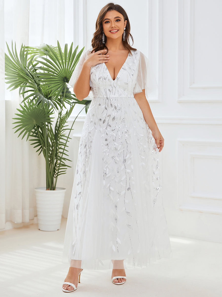 Plus size formal evening gown, navy blue, featuring ruffle sleeves and a floor-length silhouette. 21