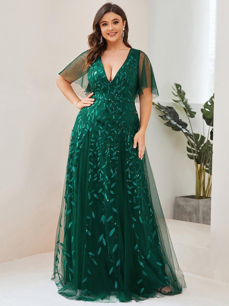Plus size formal evening gown, navy blue, featuring ruffle sleeves and a floor-length silhouette. 22