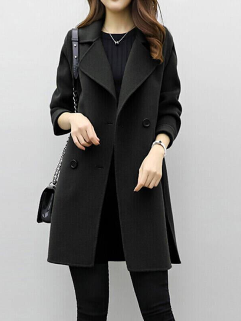 Longline double-breasted coat for women with wide notched lapels.