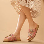 Tan leather buckle sandals with a minimalist design, perfect for casual summer outings. 3