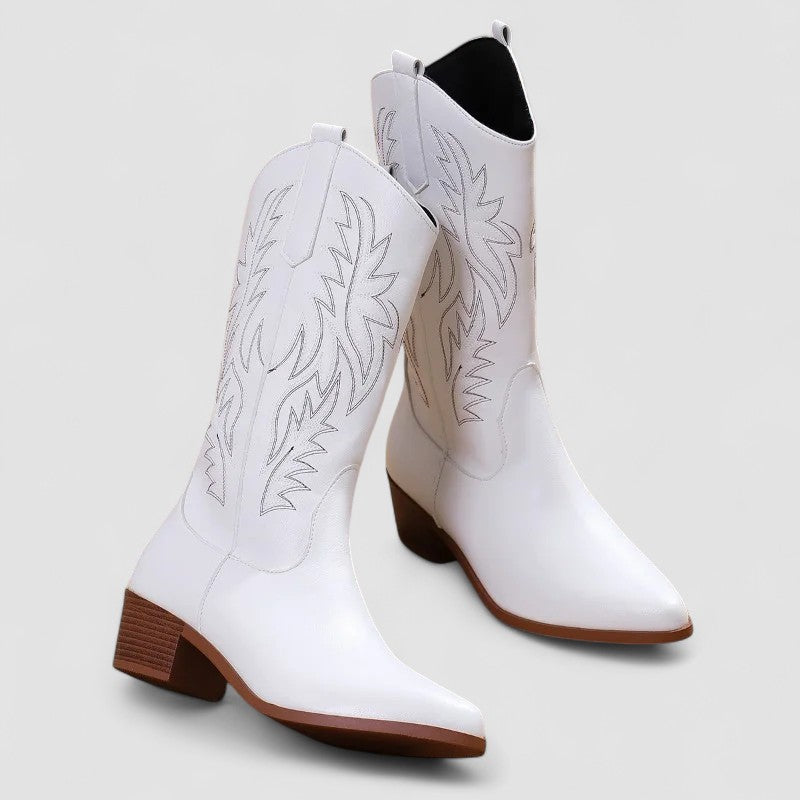 Women's orthopedic leather-look mid-calf western boots with tonal flame stitching.