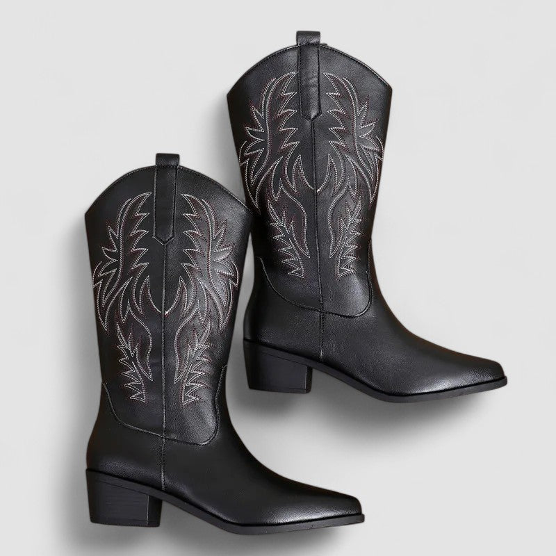 Women's orthopedic leather-look mid-calf western boots with tonal flame stitching.