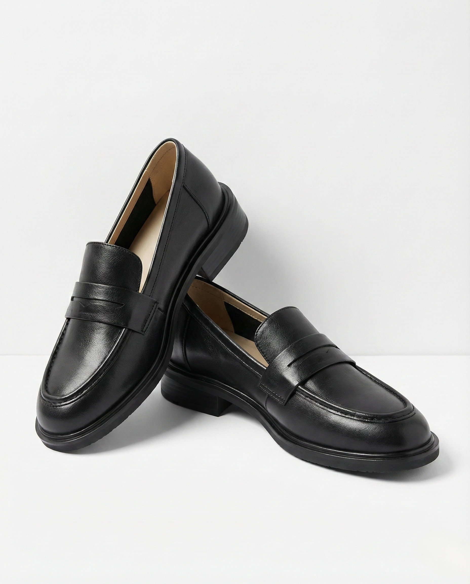 Stylish burgundy loafers with a classic heritage design, featuring a sleek silhouette and comfortable fit. 3