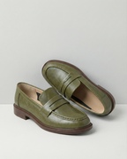 Stylish burgundy loafers with a classic heritage design, featuring a sleek silhouette and comfortable fit. 4