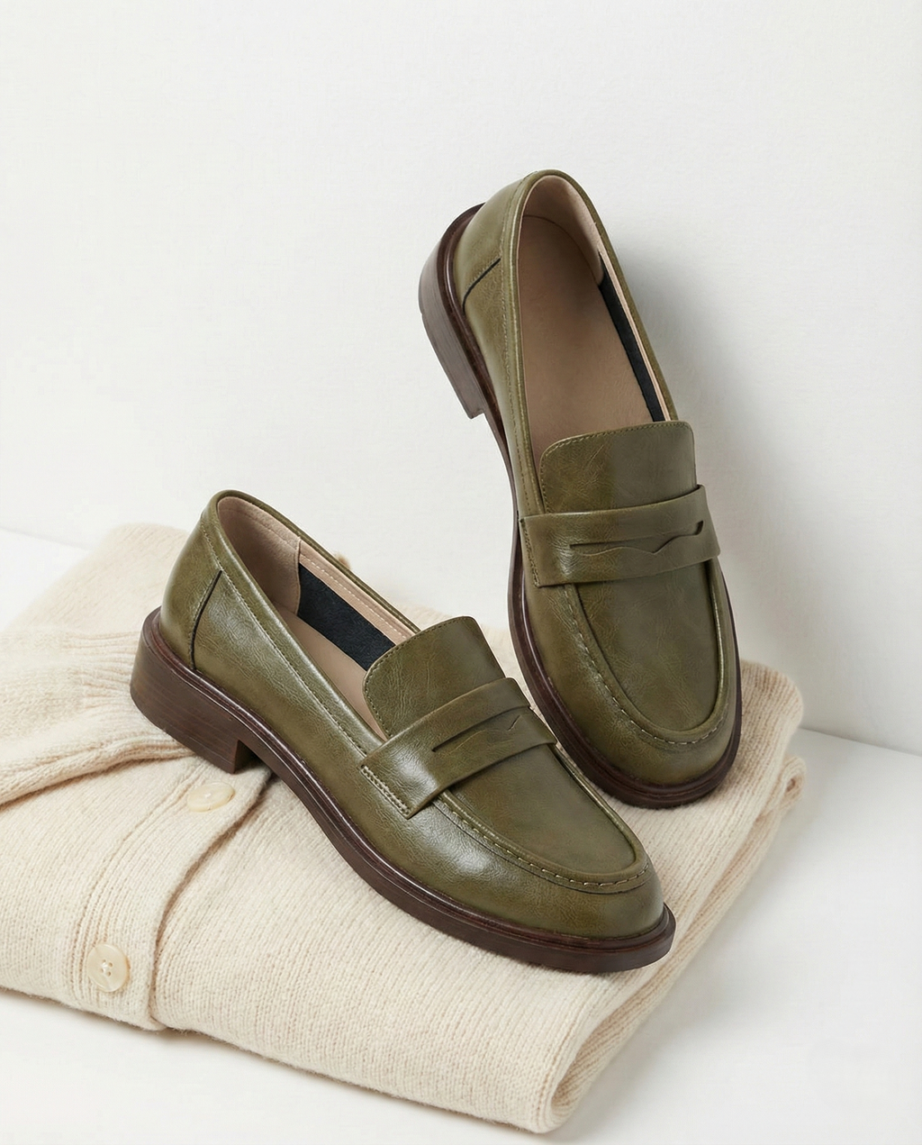 Stylish burgundy loafers with a classic heritage design, featuring a sleek silhouette and comfortable fit. 5