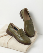 Stylish burgundy loafers with a classic heritage design, featuring a sleek silhouette and comfortable fit. 5