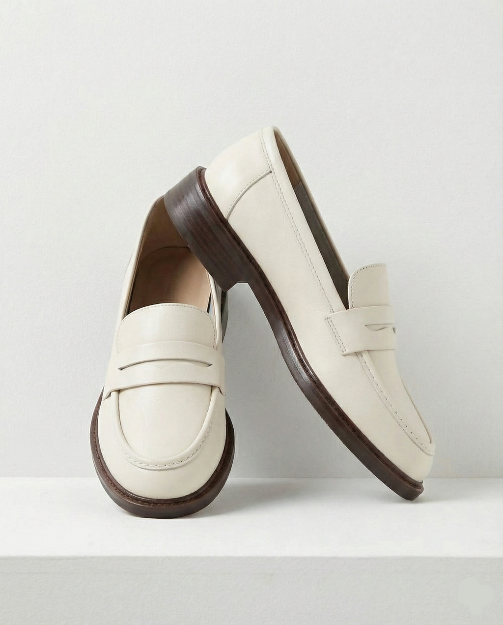 Stylish burgundy loafers with a classic heritage design, featuring a sleek silhouette and comfortable fit. 6