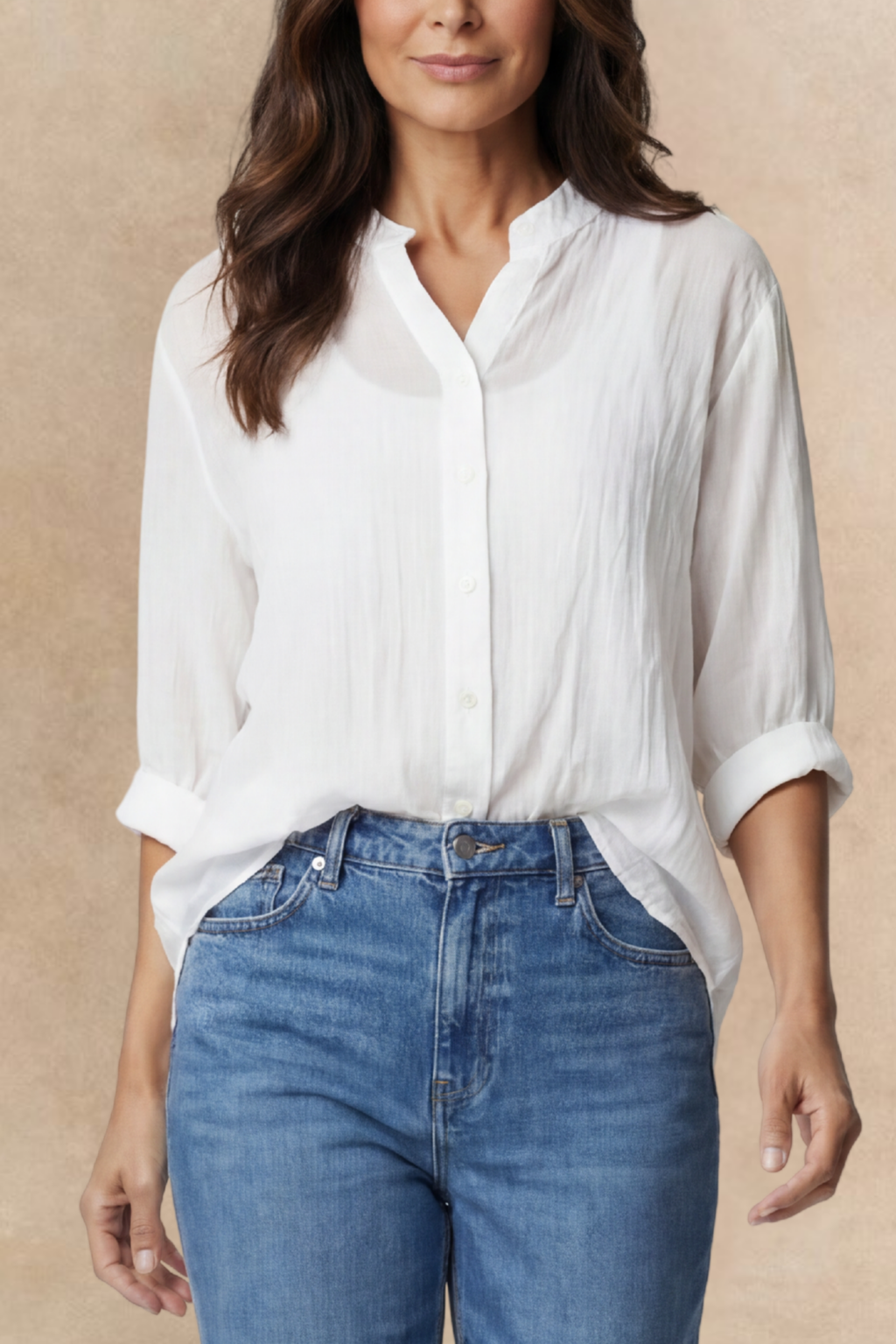 Oversized semi-sheer white shirt in a cotton blend, featuring a relaxed fit and a V-neckline. 1