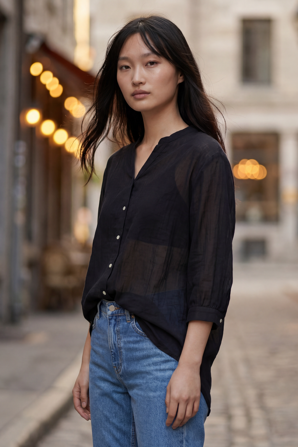 Oversized semi-sheer white shirt in a cotton blend, featuring a relaxed fit and a V-neckline. 6