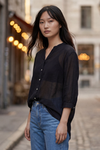 Oversized semi-sheer white shirt in a cotton blend, featuring a relaxed fit and a V-neckline. 6