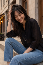 Oversized semi-sheer white shirt in a cotton blend, featuring a relaxed fit and a V-neckline. 9