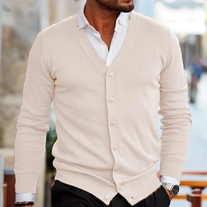 Roy men's v-neck cardigan with button front, cream, worn with a white shirt