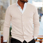 Roy men's v-neck cardigan with button front, cream, worn with a white shirt