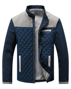 Men's quilted jacket with contrast corduroy shoulder panels and a stand collar.