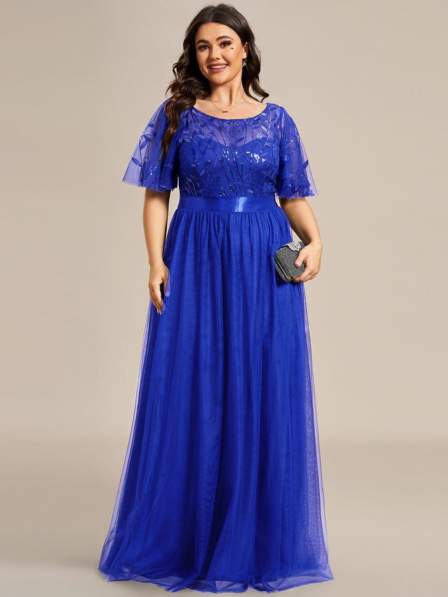 Royal blue plus size gown with a sequinned leaf bodice, satin waistband and tulle skirt.
