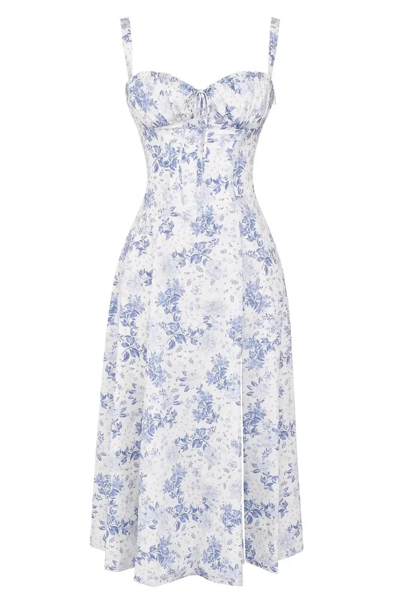 Floral print midi dress in soft pastel colors with a fitted bustier bodice, featuring a flowing skirt. 13