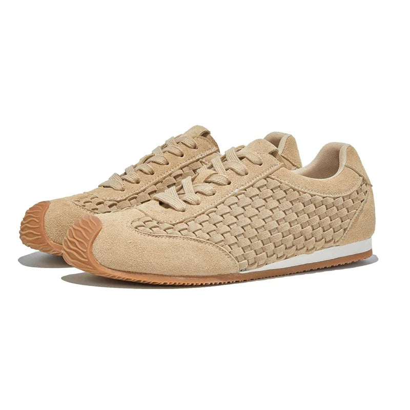 A textured, sienna-colored runner with a woven design, adding warmth and style to any space. 0