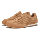 A textured, sienna-colored runner with a woven design, adding warmth and style to any space. 1