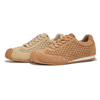 A textured, sienna-colored runner with a woven design, adding warmth and style to any space. 2