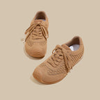 A textured, sienna-colored runner with a woven design, adding warmth and style to any space. 3