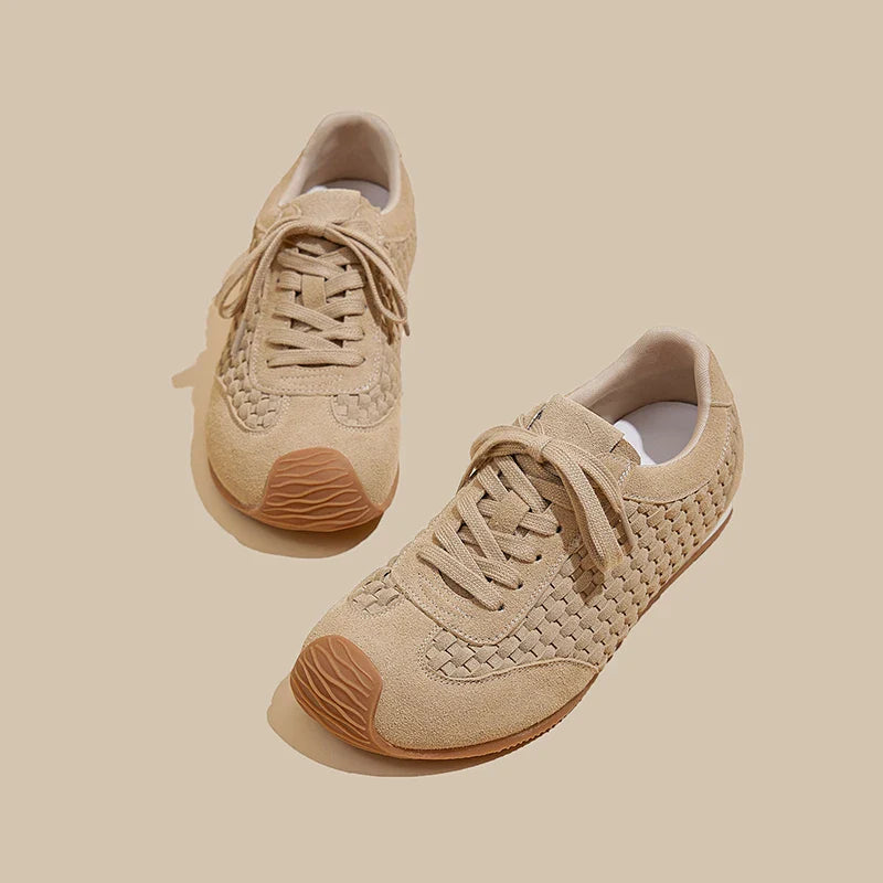 A textured, sienna-colored runner with a woven design, adding warmth and style to any space. 4