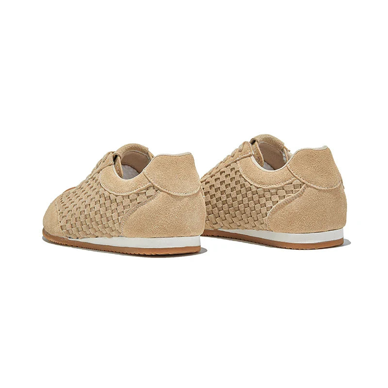A textured, sienna-colored runner with a woven design, adding warmth and style to any space. 5