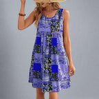 A flowing, floral-patterned dress in soft pastel colors with a relaxed boho style, perfect for summer days. 3