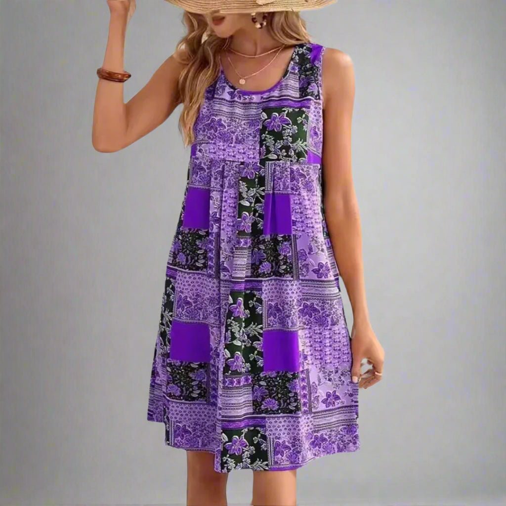 A flowing, floral-patterned dress in soft pastel colors with a relaxed boho style, perfect for summer days. 5