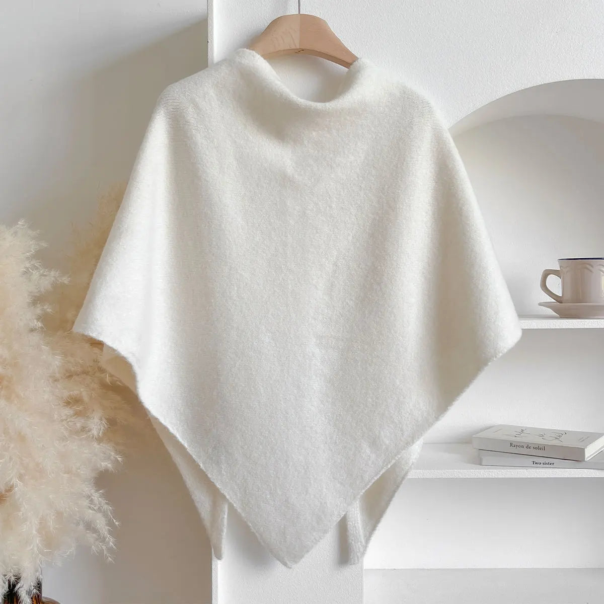 Sterre knitted triangle shawl, white, on hanger