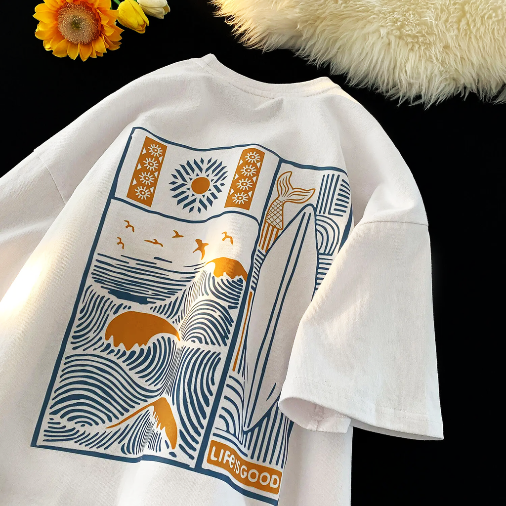 Oversized t-shirt in a warm sunset gradient, featuring a relaxed fit and soft fabric for casual wear. 0