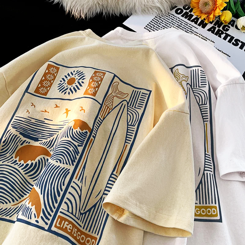 Oversized t-shirt in a warm sunset gradient, featuring a relaxed fit and soft fabric for casual wear. 2
