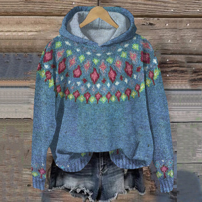 Blue lightweight knit hoodie for women with a colourful jacquard yoke.