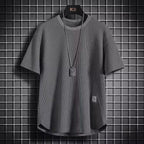 A navy blue waffle-knit men's shirt with a casual style and long sleeves. 0