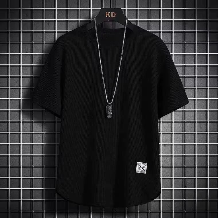 A navy blue waffle-knit men's shirt with a casual style and long sleeves. 3