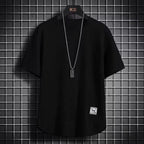 A navy blue waffle-knit men's shirt with a casual style and long sleeves. 3