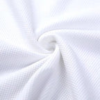 A navy blue waffle-knit men's shirt with a casual style and long sleeves. 6