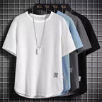 A navy blue waffle-knit men's shirt with a casual style and long sleeves. 7