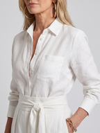 Black long-sleeve jumpsuit with a wide-leg design, offering a modern and comfortable fit for women. 5