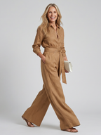 Black long-sleeve jumpsuit with a wide-leg design, offering a modern and comfortable fit for women. 6