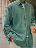 Light blue corduroy long sleeve shirt in a relaxed fit, perfect for casual wear. 1