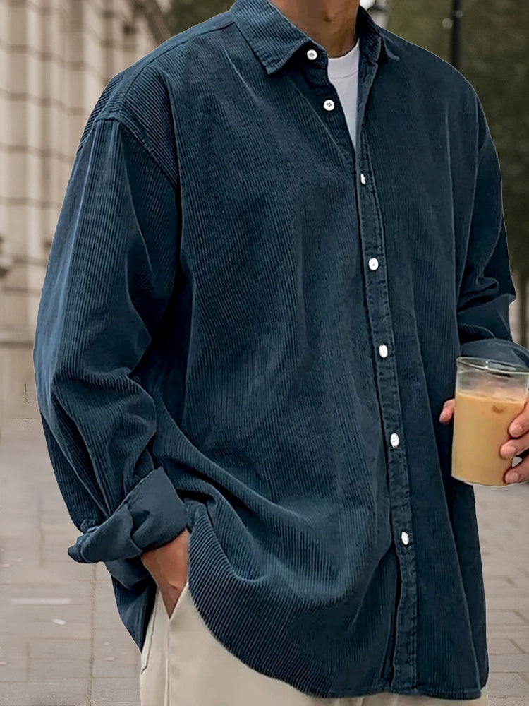 Light blue corduroy long sleeve shirt in a relaxed fit, perfect for casual wear. 10