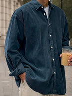 Light blue corduroy long sleeve shirt in a relaxed fit, perfect for casual wear. 10