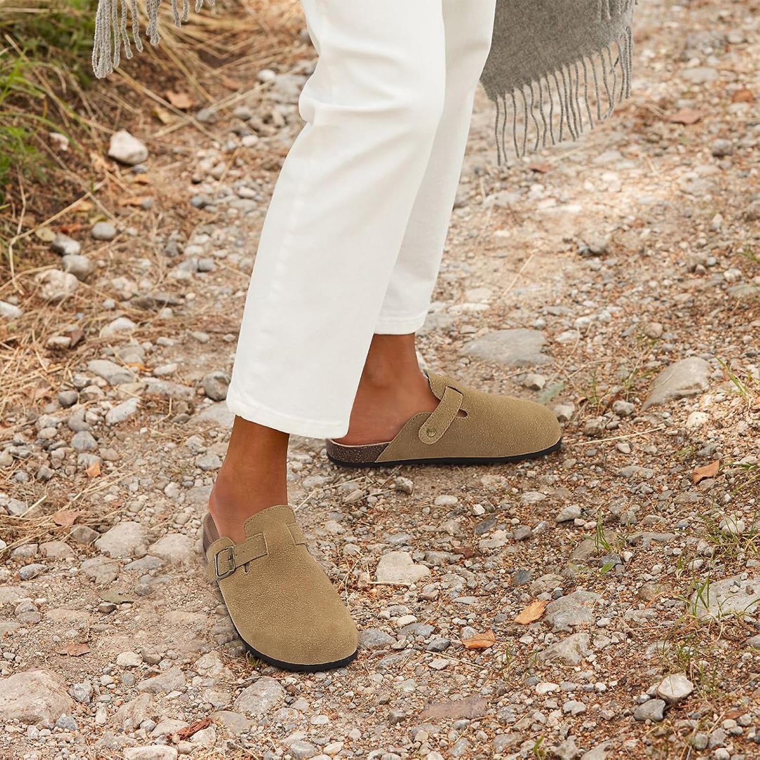 Lightweight white summer sandals with a comfortable fit and a simple, casual style. 2