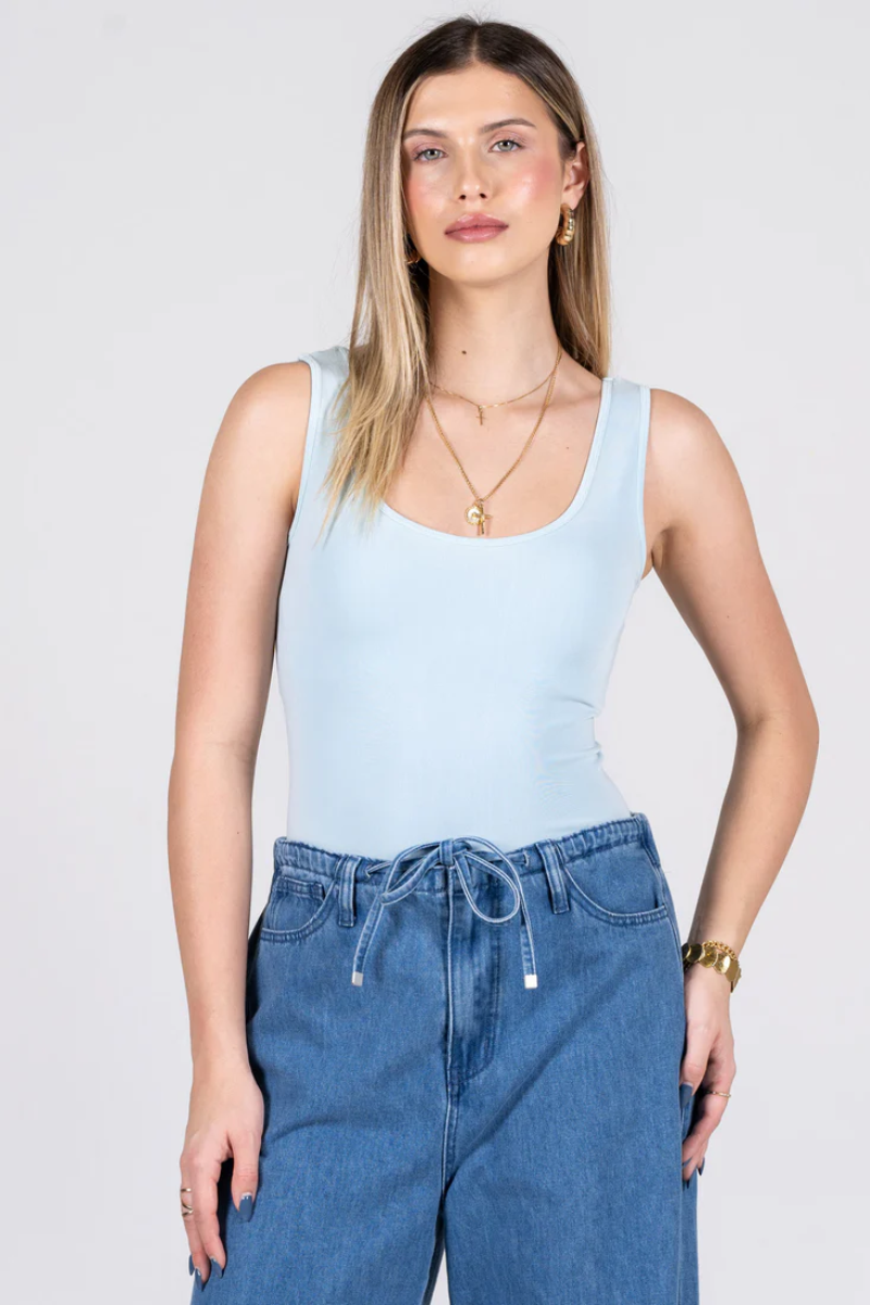 Light gray bamboo blend tank top with wide straps, featuring a relaxed and casual style for everyday wear. 1