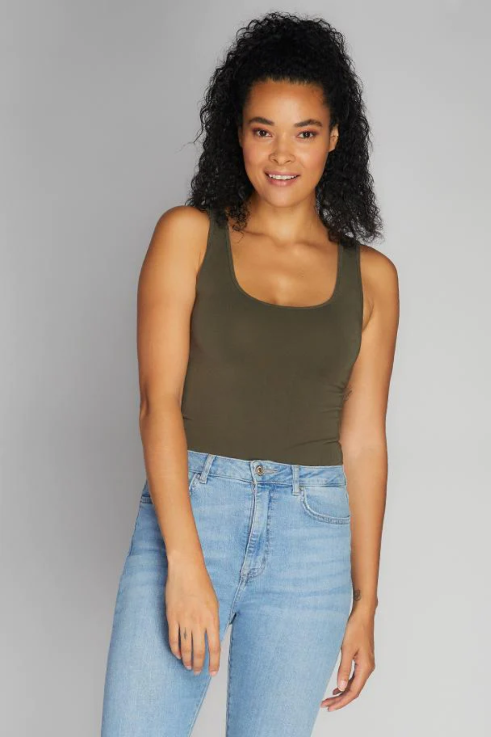 Light gray bamboo blend tank top with wide straps, featuring a relaxed and casual style for everyday wear. 8