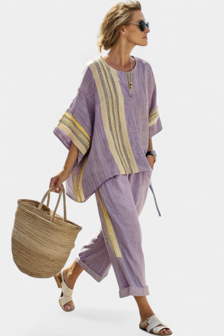 Lavender top paired with mustard striped oversized pants, creating a relaxed and chic casual outfit for women. 0