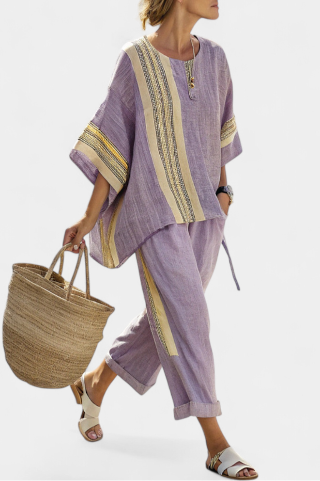 Lavender top paired with mustard striped oversized pants, creating a relaxed and chic casual outfit for women. 1
