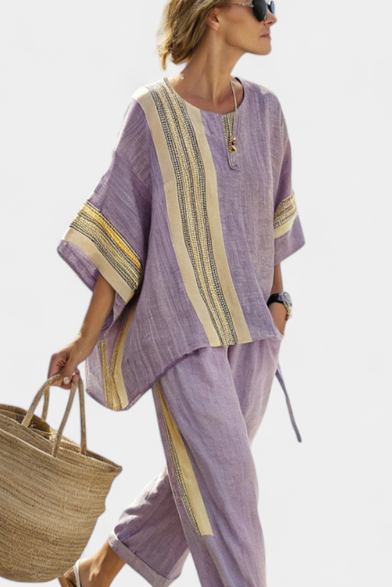 Lavender top paired with mustard striped oversized pants, creating a relaxed and chic casual outfit for women. 2