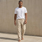 Light blue linen wide leg pants with a relaxed, bohemian style. 1