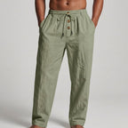 Light blue linen wide leg pants with a relaxed, bohemian style. 2